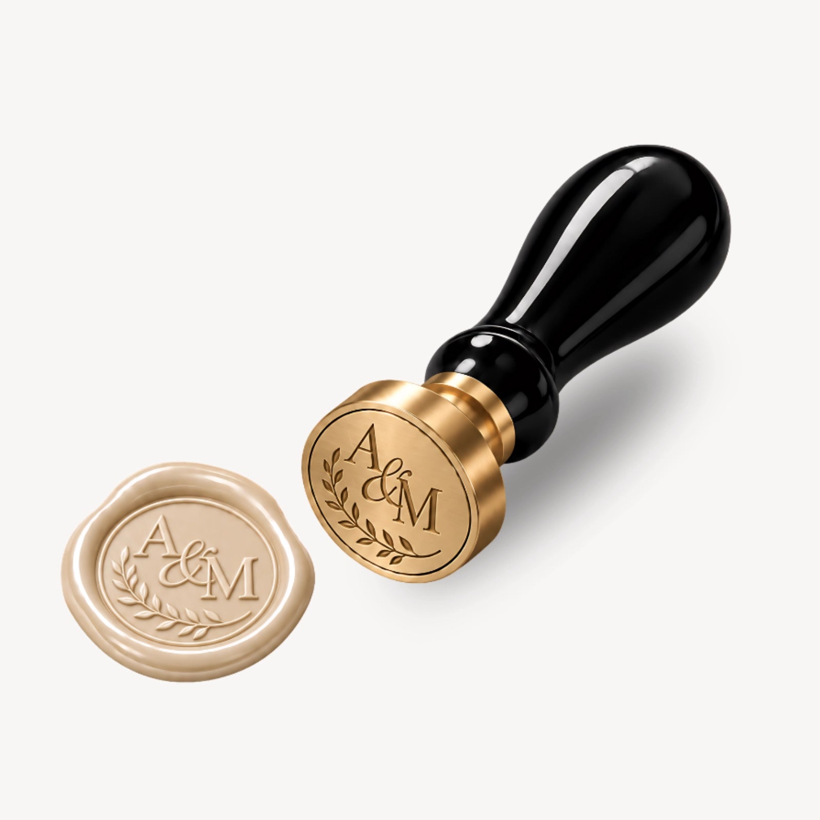 Custom monogram wax seal stamp with personalized initials and matching wax impression