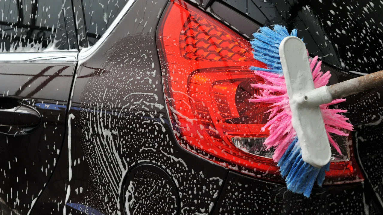 A comparison table showing car wash frequency for different driving environments.
